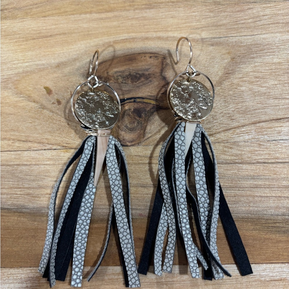 Women’s earrings, metal and leather